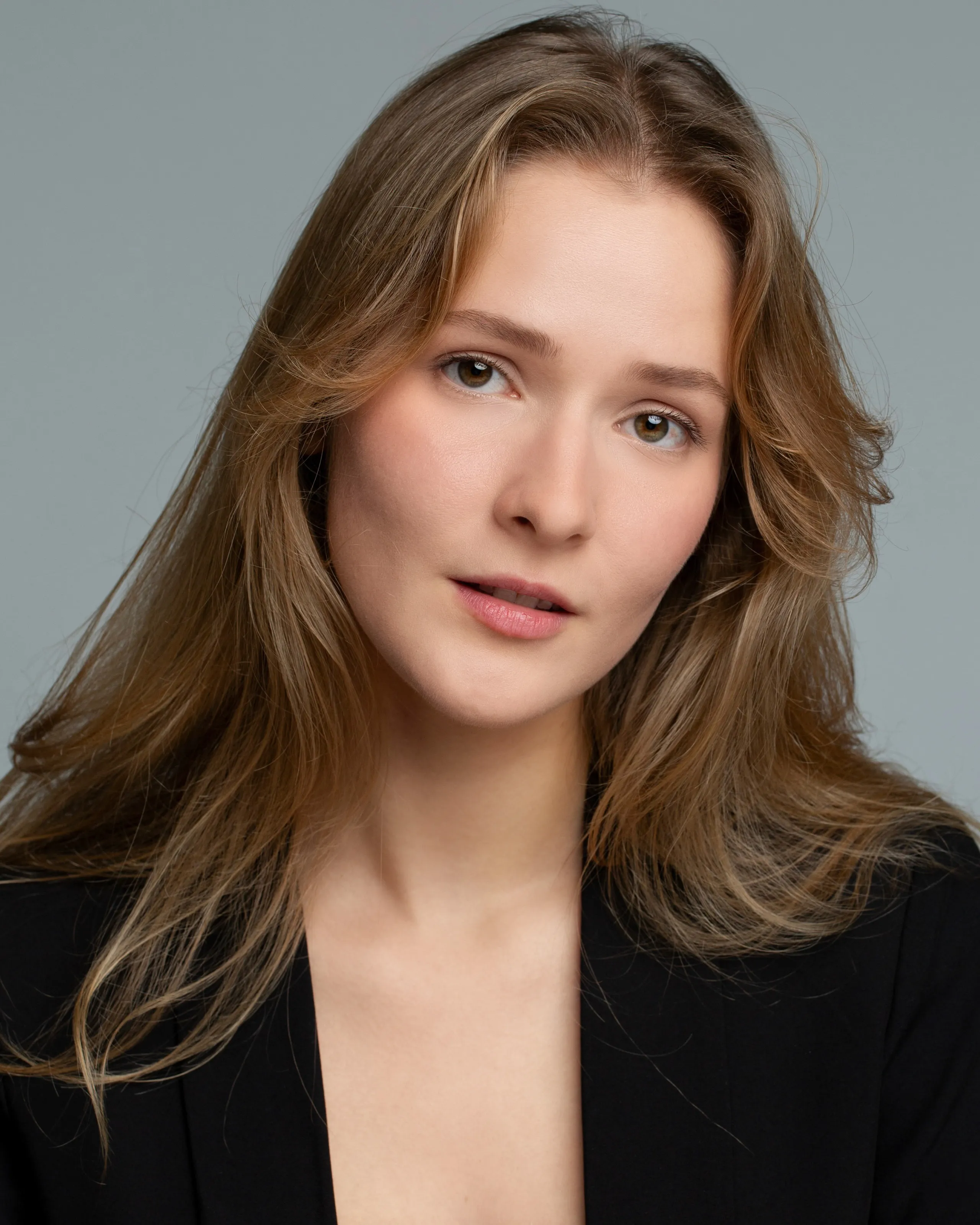 Mariia KO — studio actor headshot, pensive expression